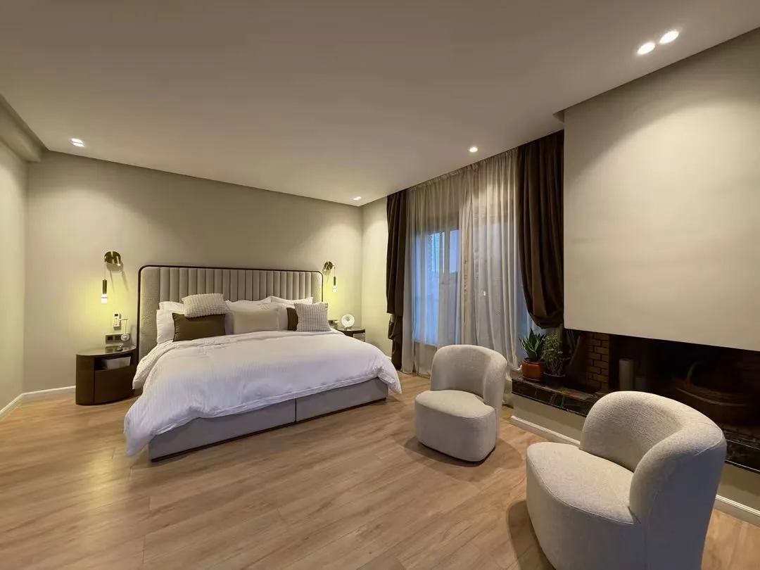 Master suite, lounge area and fireplace