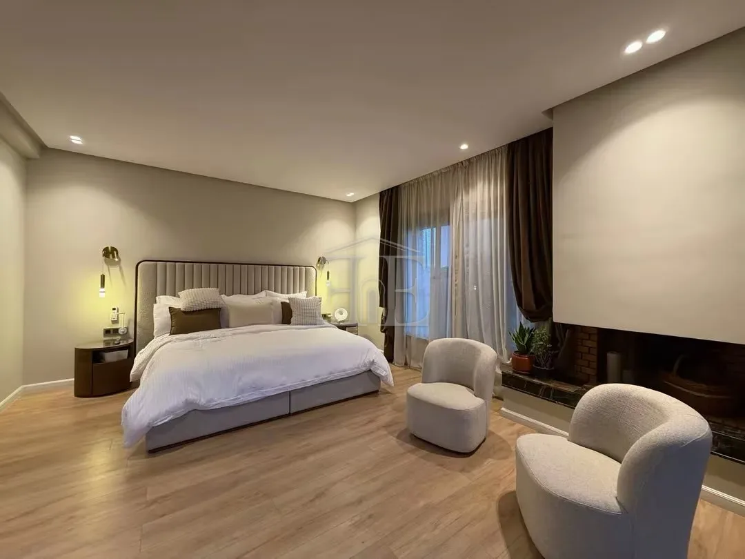 Master suite, lounge area and fireplace