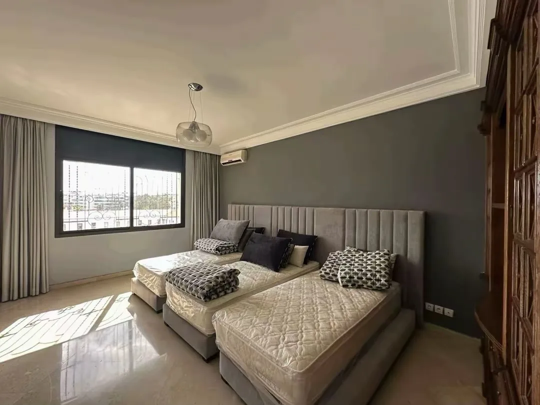 Bright bedroom with two beds
